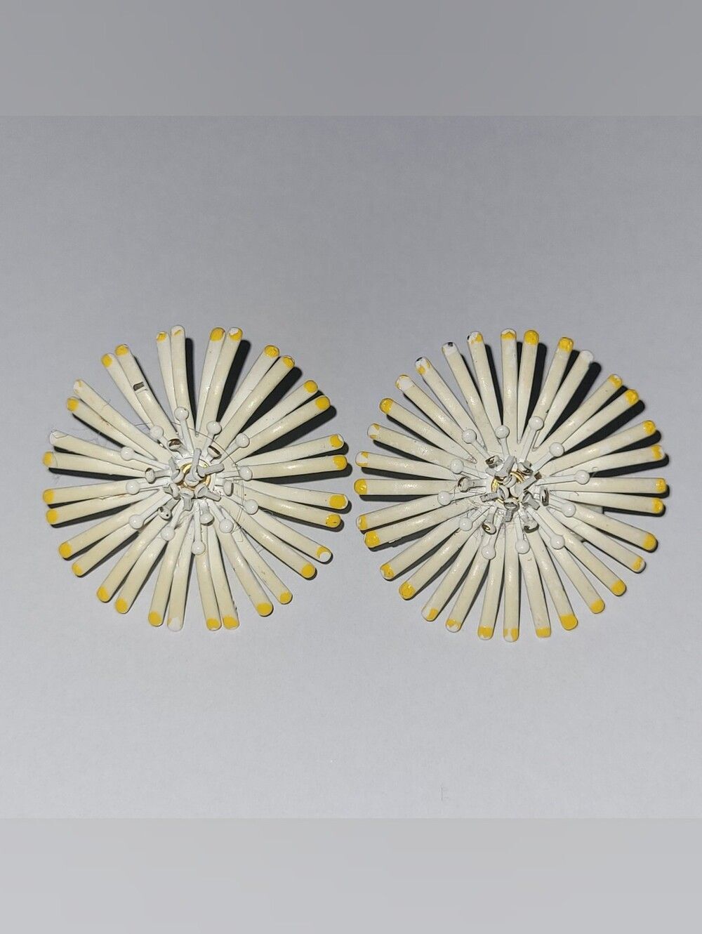White Yellow Enamel Metal Starburst Flower Clip On Earrings